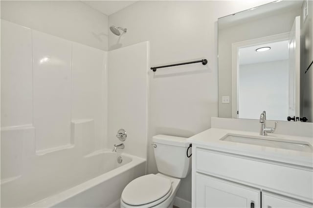 full bathroom with toilet, vanity, and tub / shower combination