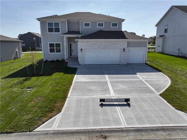 view of front of house featuring a front lawn and a garage