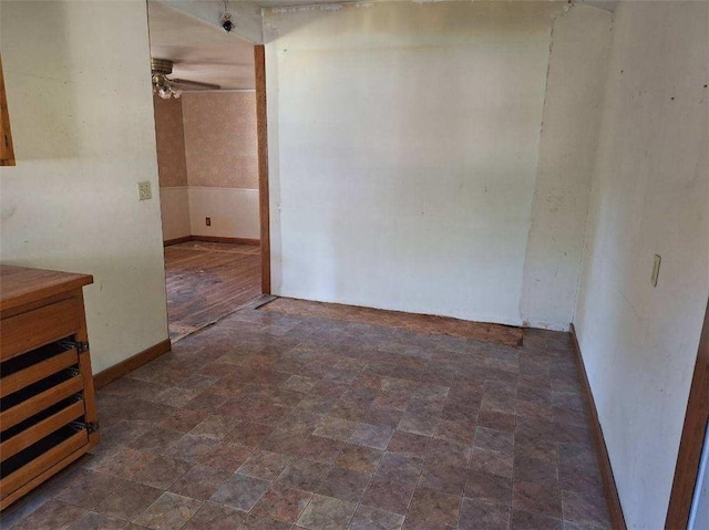 unfurnished room featuring ceiling fan