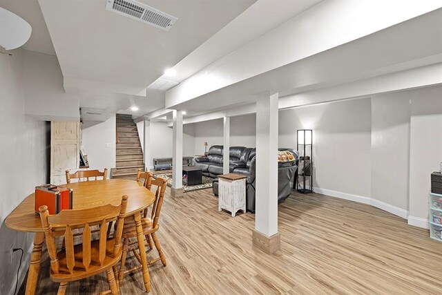 dining space featuring light wood-type flooring