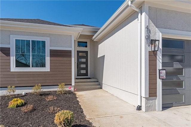 property entrance featuring a garage