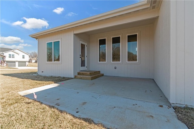 doorway to property featuring a patio