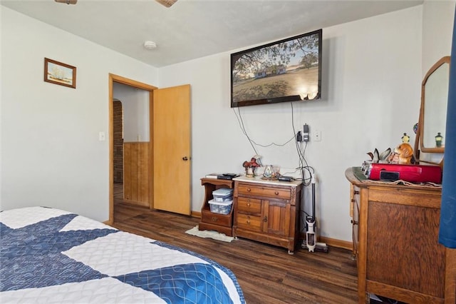 bedroom featuring dark hardwood / wood-style floors