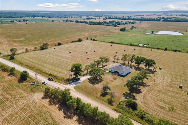 birds eye view of property featuring a rural view