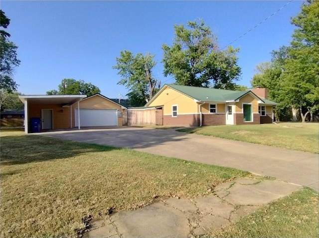 ranch-style home with a front lawn and a carport