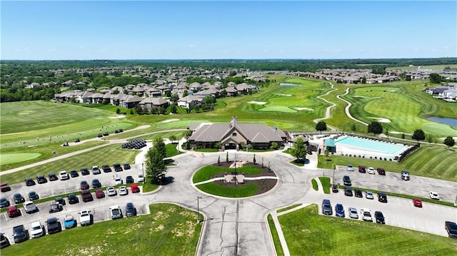 780 Creekmoor Dr, Raymore, MO 64083 - aerial view of residential area with a local golf course and a large body of water