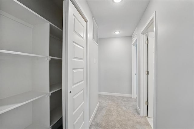 780 Creekmoor Dr, Raymore, MO 64083 - corridor featuring carpet, baseboards, and recessed lighting