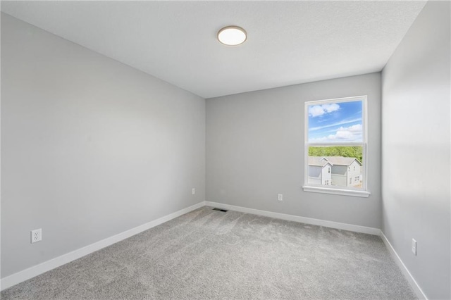 780 Creekmoor Dr, Raymore, MO 64083 - unfurnished room featuring light carpet and baseboards