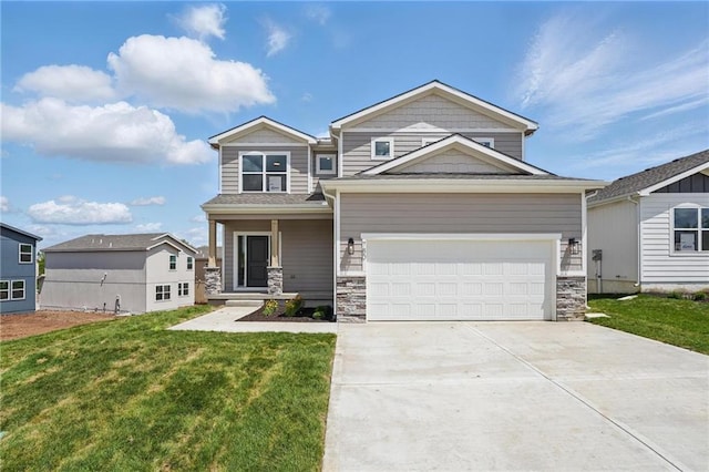 780 Creekmoor Dr, Raymore, MO 64083 - view of front of home with a front lawn, concrete driveway, and stone siding