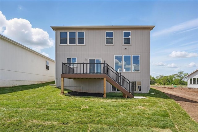 780 Creekmoor Dr, Raymore, MO 64083 - rear view of property with stairs, a wooden deck, and a yard