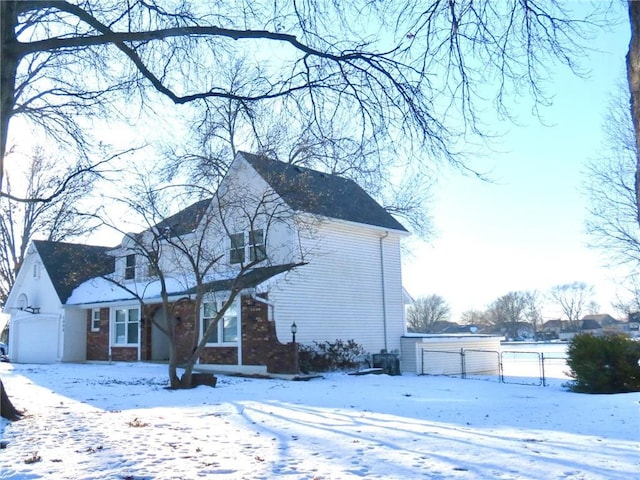 view of snow covered property