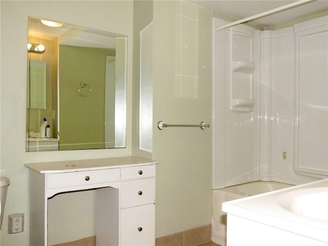 bathroom with shower / bathtub combination and vanity