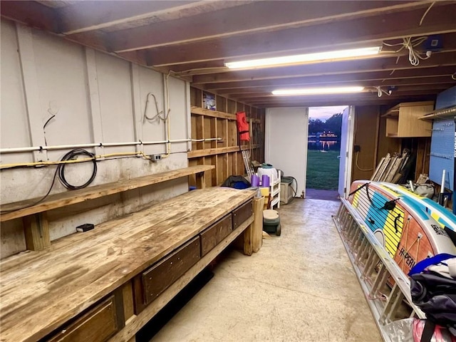 basement with a workshop area