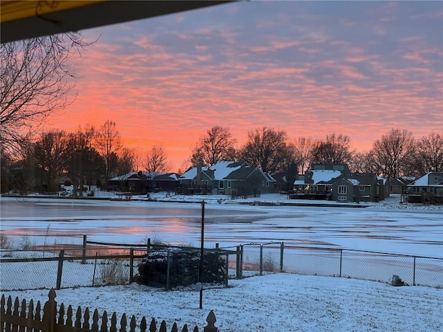 view of yard layered in snow