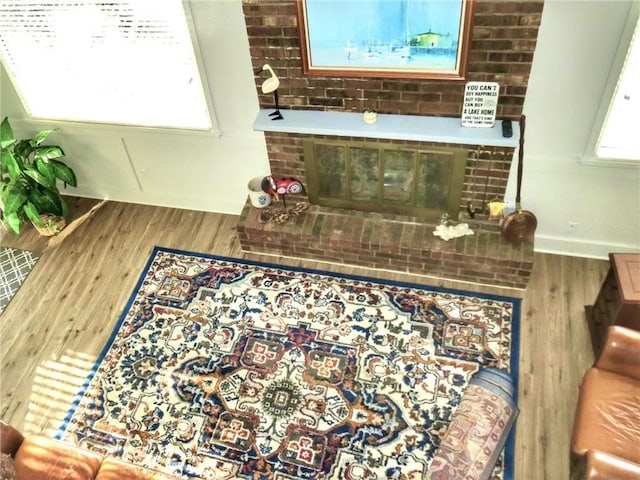 1005 Johnston Dr, Raymore, MO 64083 - living room with wood finished floors
