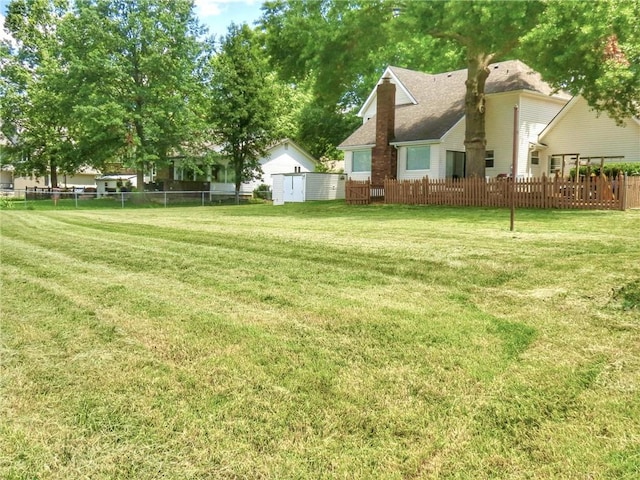 1005 Johnston Dr, Raymore, MO 64083 - view of yard