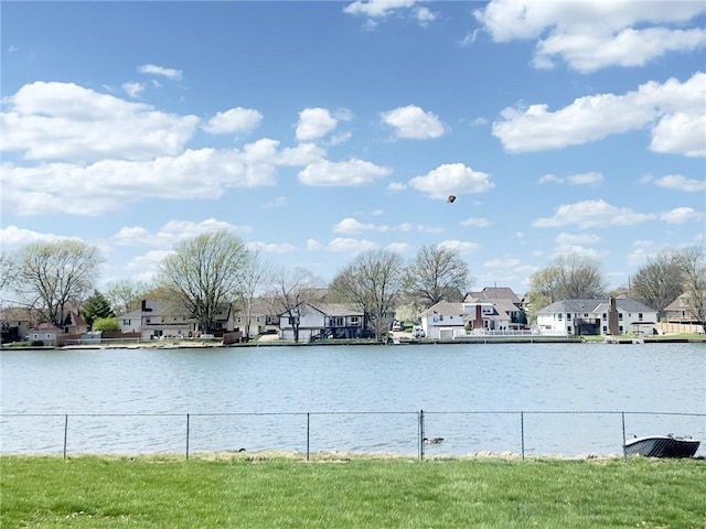 1005 Johnston Dr, Raymore, MO 64083 - water view with nearby suburban area