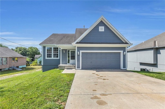 view of front facade featuring a front yard and a garage