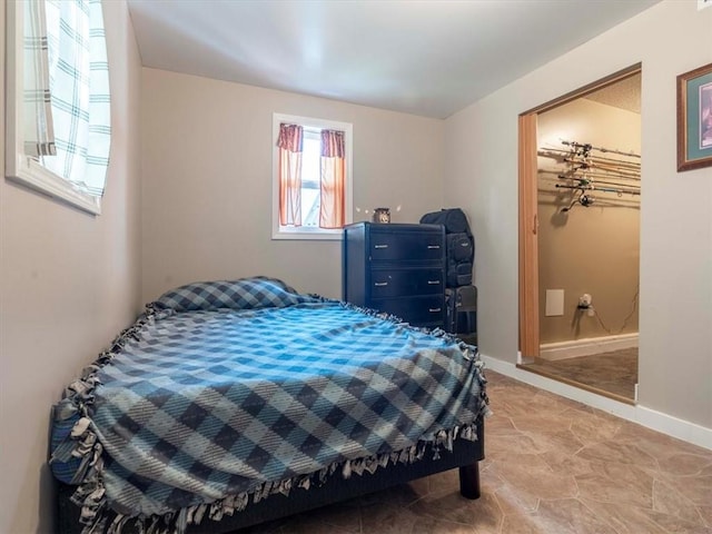 bedroom featuring tile patterned floors