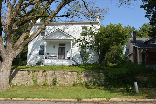 view of front of home featuring covered porch