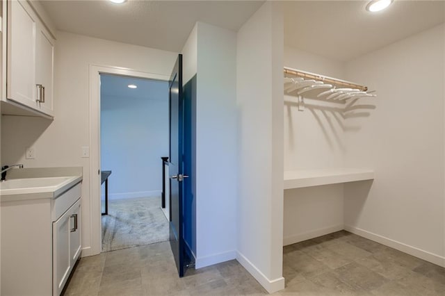 laundry area with sink