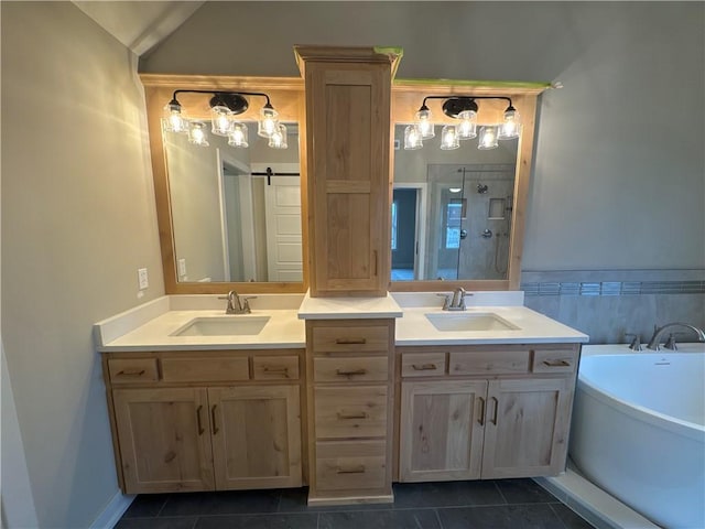 bathroom featuring vanity, shower with separate bathtub, and tile patterned floors