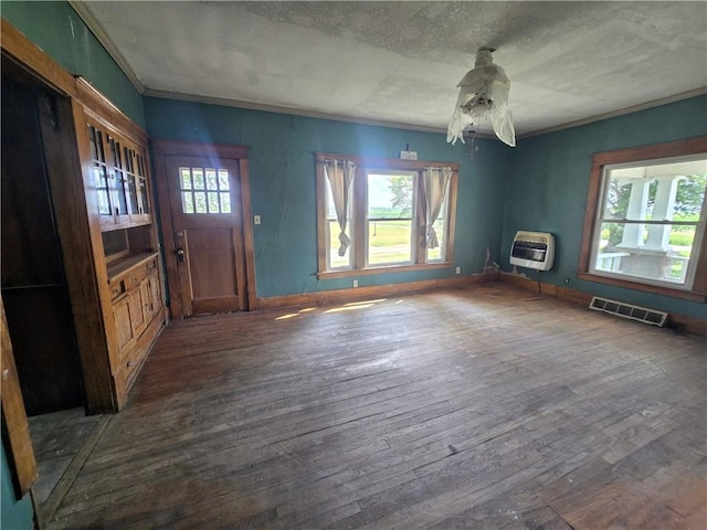 interior space featuring a textured ceiling, hardwood / wood-style floors, and ceiling fan