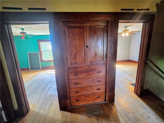 hallway featuring hardwood / wood-style floors