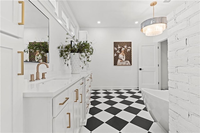 bathroom featuring a bathing tub and vanity