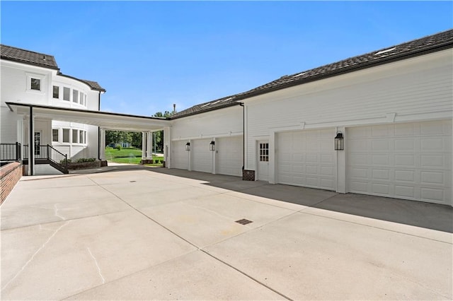 view of side of home featuring covered porch