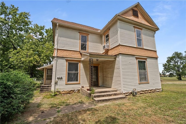 view of front of house with a front lawn