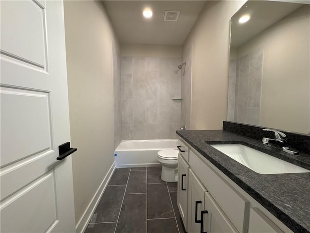 full bathroom with vanity, toilet, tile patterned floors, and tiled shower / bath