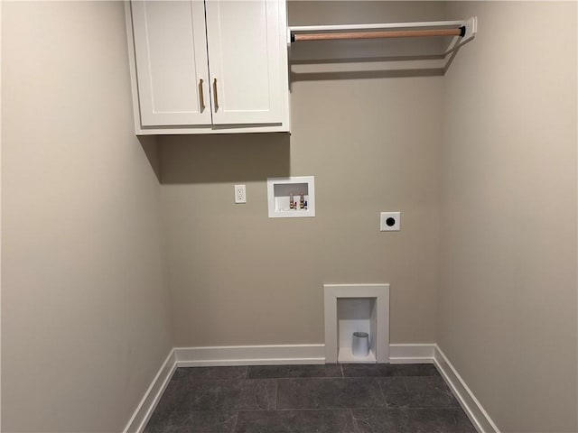 clothes washing area featuring hookup for a washing machine, electric dryer hookup, and cabinets