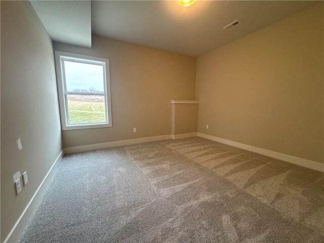 view of carpeted spare room