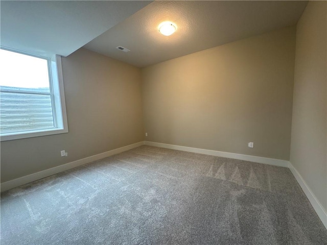 empty room with carpet floors