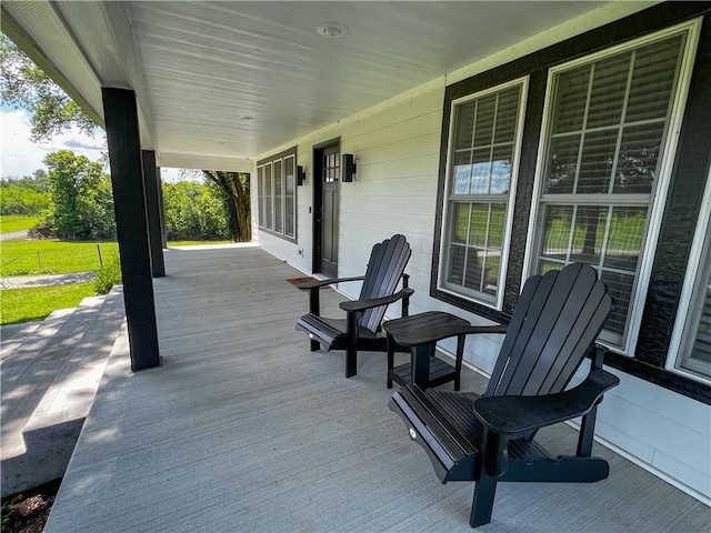 view of patio featuring covered porch