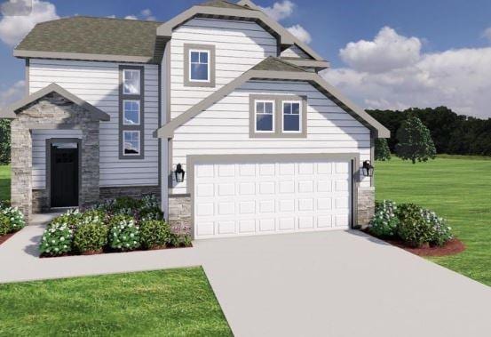 view of front facade with a garage and a front yard