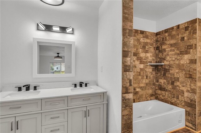 bathroom with dual bowl vanity