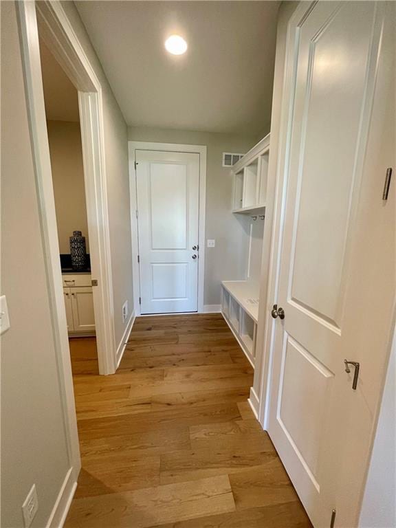 mudroom featuring light hardwood / wood-style floors