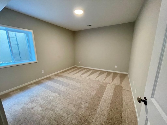 view of carpeted spare room