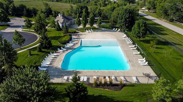 view of swimming pool with a patio area