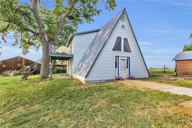 exterior space with a front yard