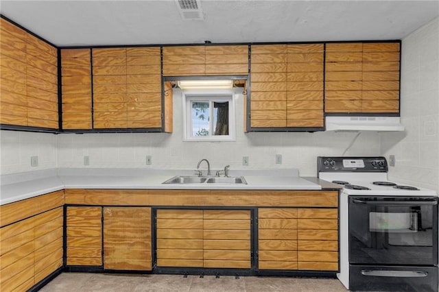 kitchen with light tile patterned floors, white range with electric cooktop, custom exhaust hood, and sink