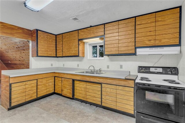 kitchen with light tile patterned flooring, wooden walls, white electric range, ventilation hood, and sink