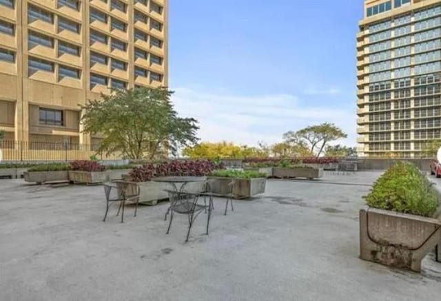 view of community with a patio area