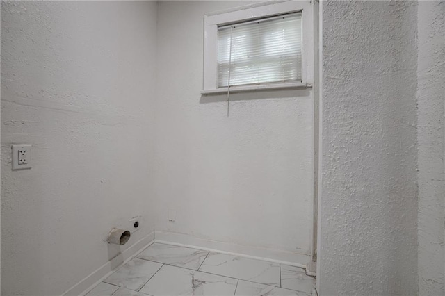 laundry room featuring electric dryer hookup