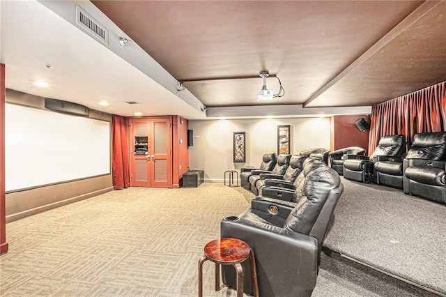 home theater featuring light carpet