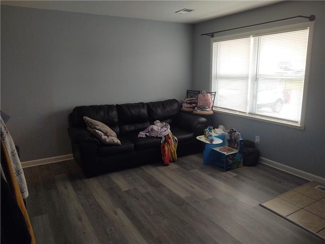 living room featuring dark hardwood / wood-style floors