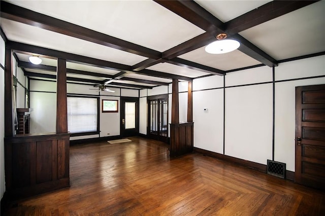 unfurnished room featuring coffered ceiling and beamed ceiling