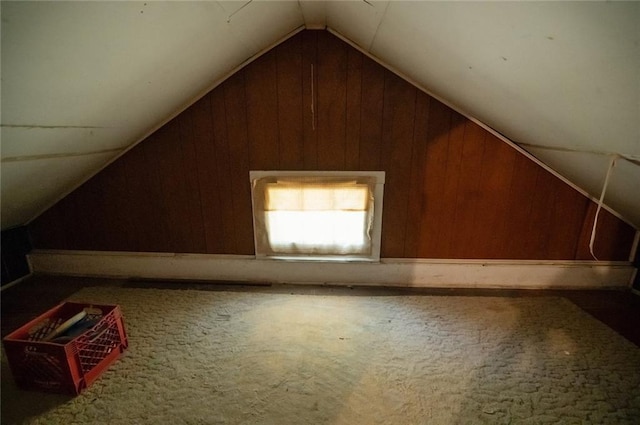 bonus room featuring lofted ceiling